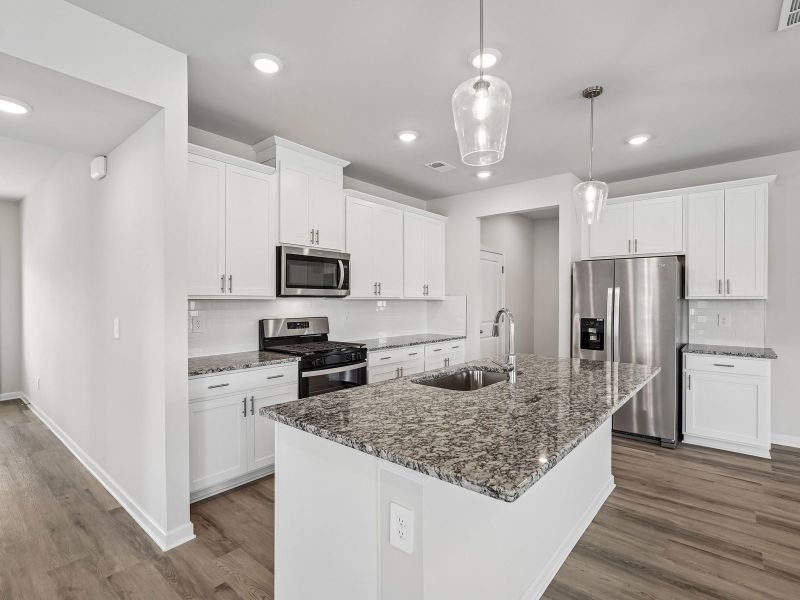 Furnished interior view inside a new home in Northwoods at Mirror Lake, Villa Rica (Image 5).