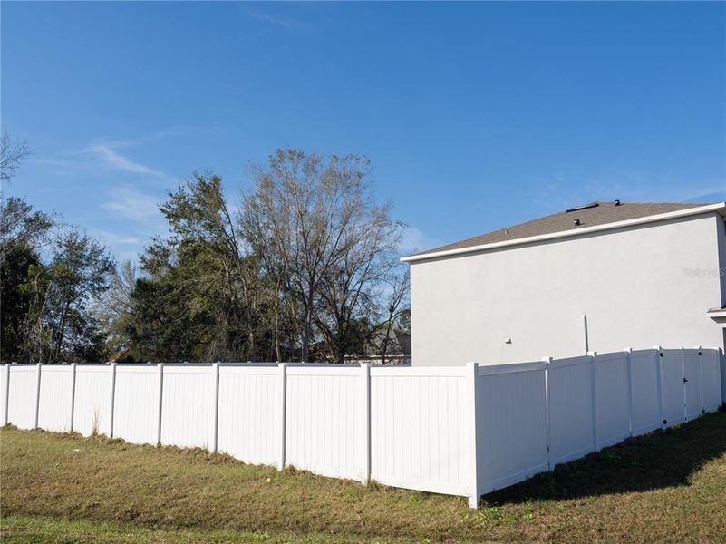 Exterior details and patio area of a home in Poinciana Enclave, Kissimmee (Image 18).