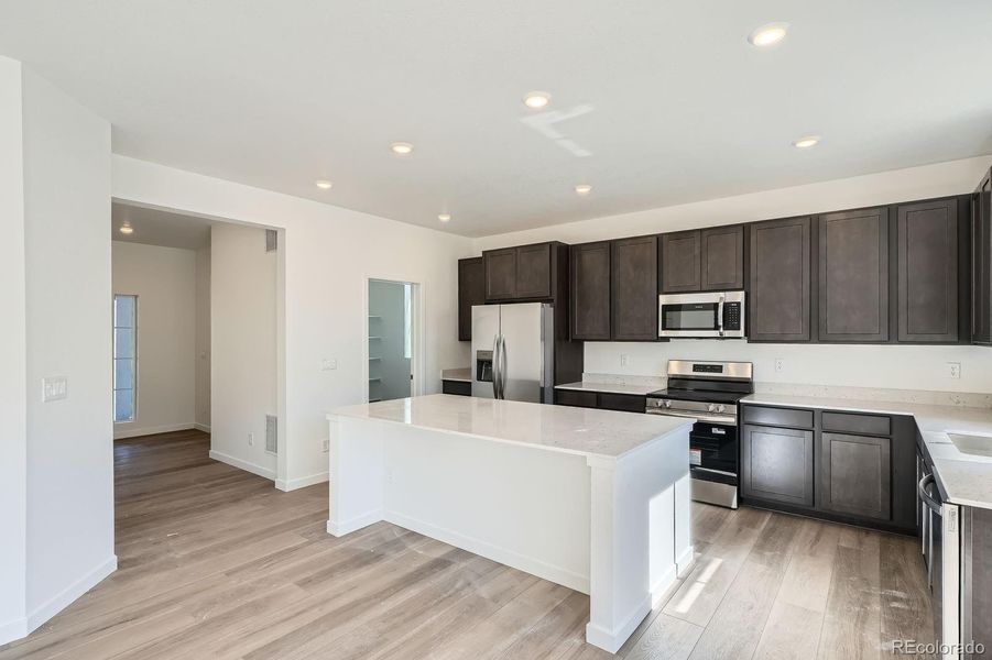Furnished interior view inside a new home in Newlin Crossing: The Pioneer Collection, Parker (Image 6).