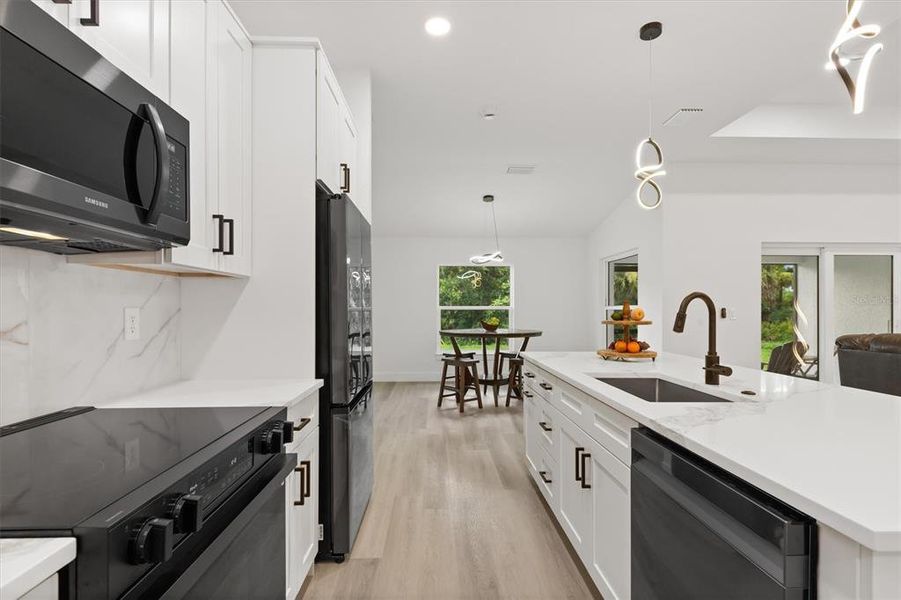 Furnished interior view inside a new home in , Port Charlotte (Image 18). Furnished interior view inside a new home in , Port Charlotte (Image 18).