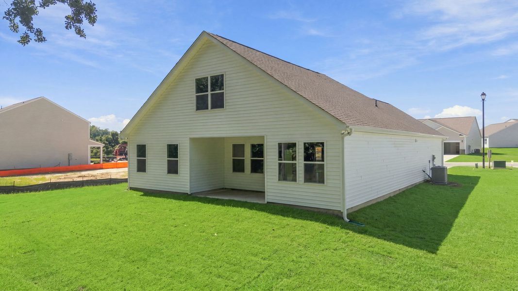 Exterior details and patio area of a home in Villa Grande, Winterville (Image 4).