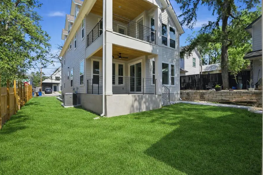 Back of house featuring ceiling fan and a patio + balcony. Landscape virtually enhanced.