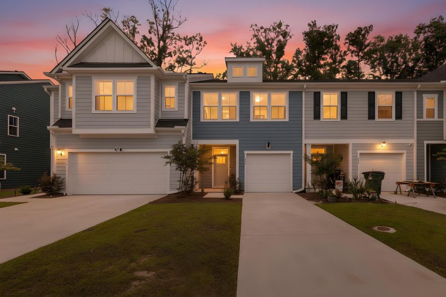 Front exterior of a new home in Boykins Run Townhomes, Moncks Corner, SC, highlighting curb appeal (Image 21).