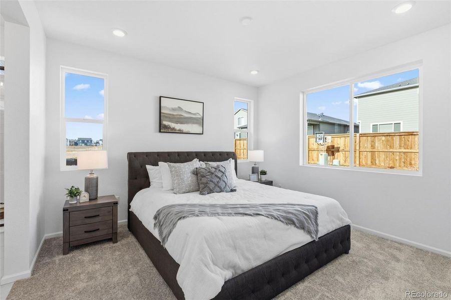 Furnished interior view inside a new home in The Cottages Collection at Ridgeline Vista, Brighton (Image 7).