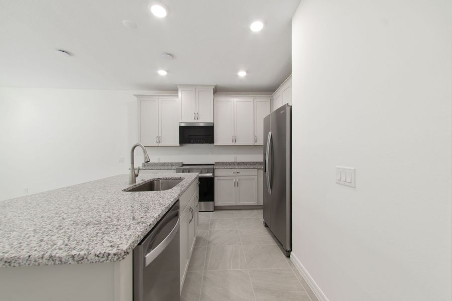 Furnished interior view inside a new home in Towns at Greenleaf, Oviedo (Image 19).