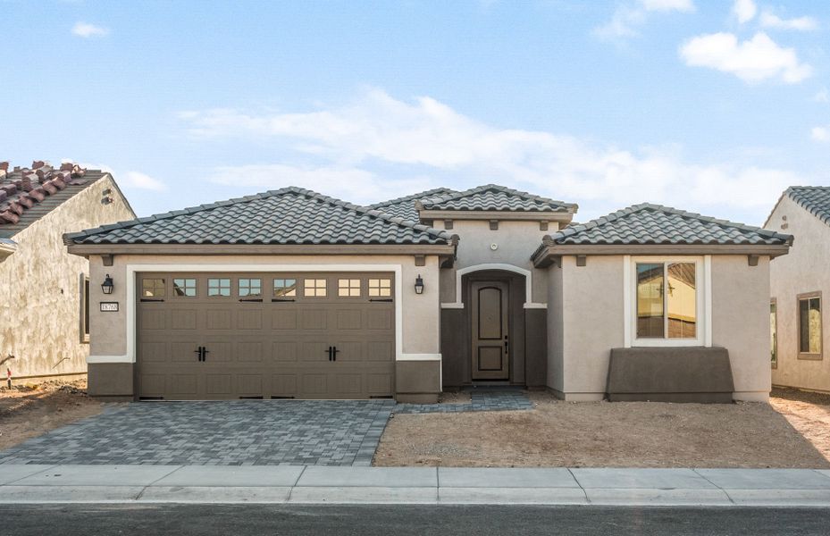 Front exterior of a new home in Sun City Festival, Buckeye, AZ, highlighting curb appeal (Image 23).