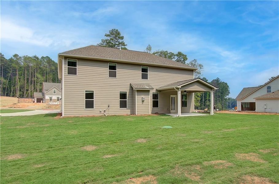 Front exterior of a new home in Riverbend Overlook, Fayetteville, GA, highlighting curb appeal (Image 17).
