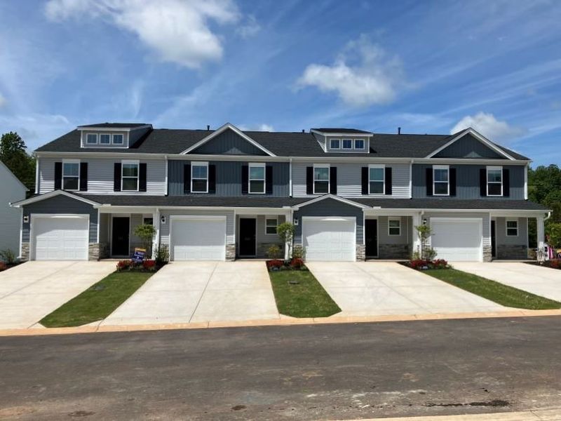 Front exterior of a new home in Meece, Easley, SC, highlighting curb appeal (Image 20). Front exterior of a new home in Meece, Easley, SC, highlighting curb appeal (Image 20).