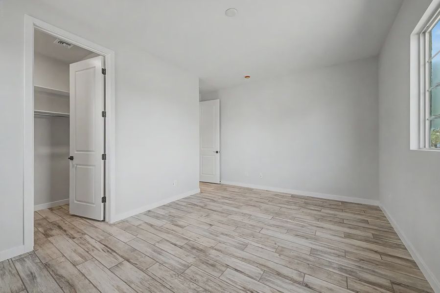 Spacious, unfurnished interior of a new home in Forté at Granite Vista, Waddell (Image 32).