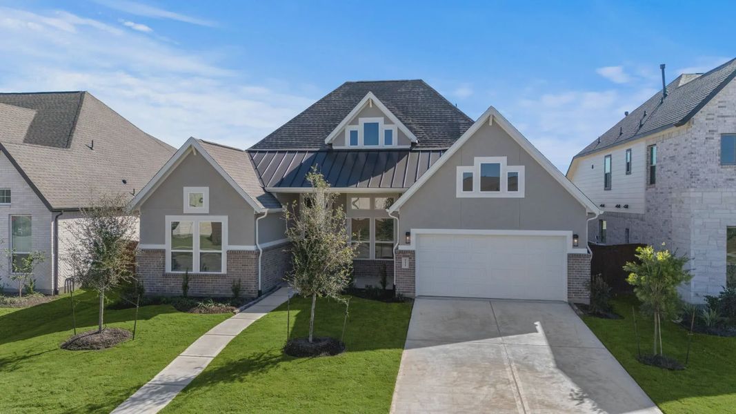 Representative exterior photo of a completed home built from the Lakeway by Chesmar Homes in Meridiana 50's, Manvel, TX (Image 29).