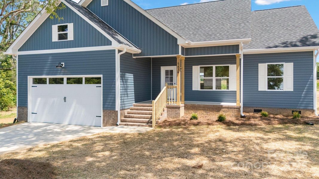 Front exterior of a new home in , Vale, NC, highlighting curb appeal (Image 21). Front exterior of a new home in , Vale, NC, highlighting curb appeal (Image 21).
