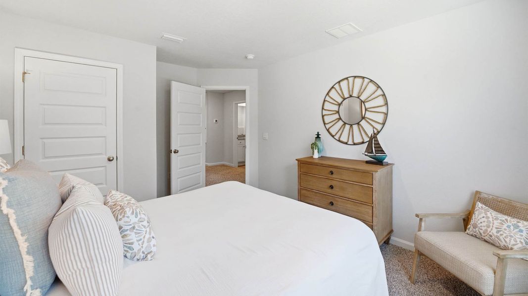 Representative furnished interior of a home built from the The Monroe by D.R. Horton in Chateau Nemours, Port Saint Joe (Image 31).
