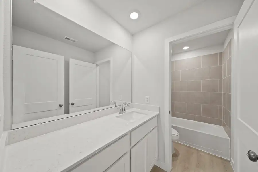 Furnished interior view inside a new home in Lakes at Black Oak, Magnolia (Image 7).