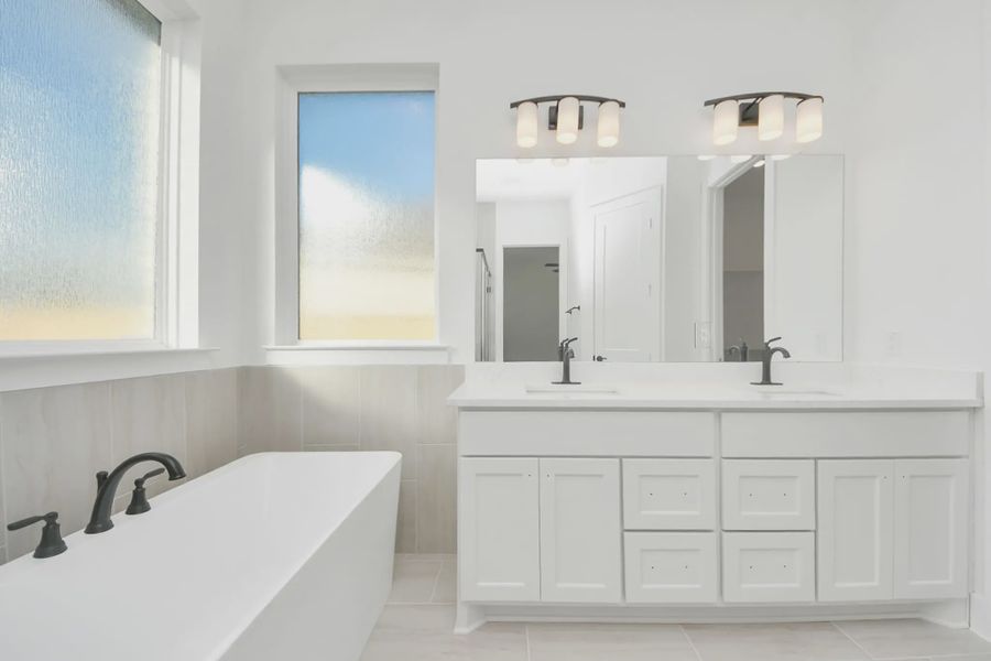 Representative furnished interior of a home built from the Bonneville by Chesmar Homes in Meridiana 50's and 60's, Manvel (Image 14).