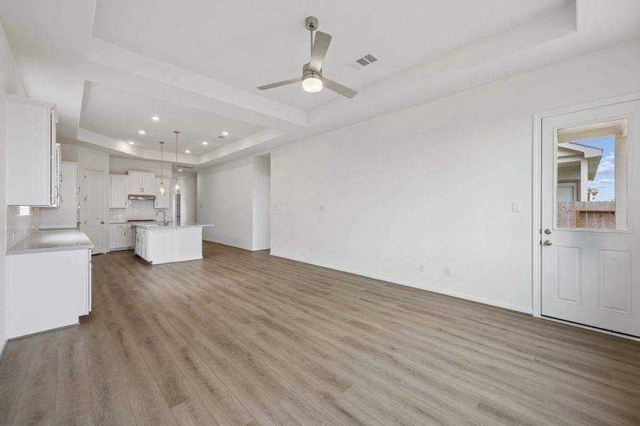 Gathering room. Sample product photo. Actual exterior and interior selections may vary by homesite. Photo may be virtually staged.