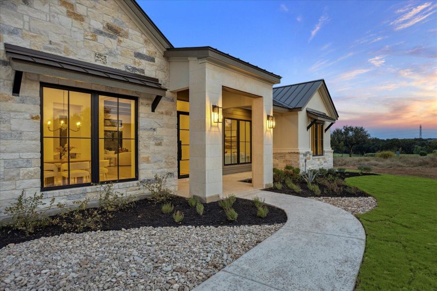 Front exterior of a new home in , Horseshoe Bay, TX, highlighting curb appeal (Image 23). Front exterior of a new home in , Horseshoe Bay, TX, highlighting curb appeal (Image 23).