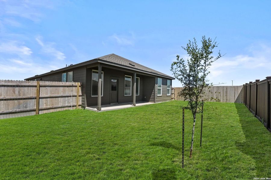 Exterior details and patio area of a home in Sky Ranch, New Braunfels (Image 2).