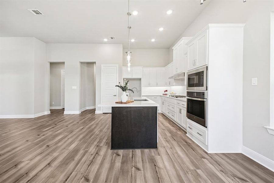 Furnished interior view inside a new home in Elements at Viridian - Garden Series, Arlington (Image 15). Furnished interior view inside a new home in Elements at Viridian - Garden Series, Arlington (Image 15).