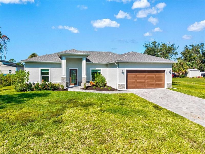 Exterior details and patio area of a home in , North Port (Image 26).
