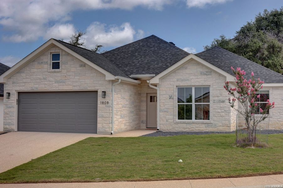 Front exterior of a new home in , Kerrville, TX, highlighting curb appeal (Image 22).