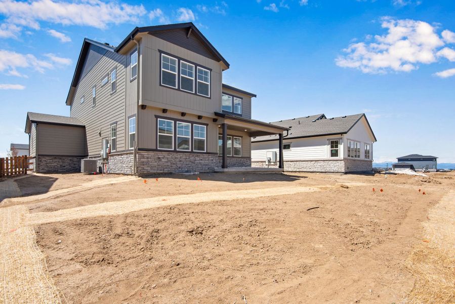 Exterior details and patio area of a home in The Aurora Highlands, Aurora (Image 4).
