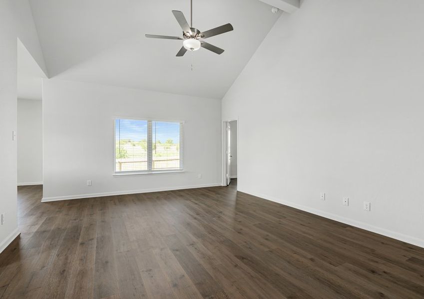 The living room has large windows that let in great, natural light.