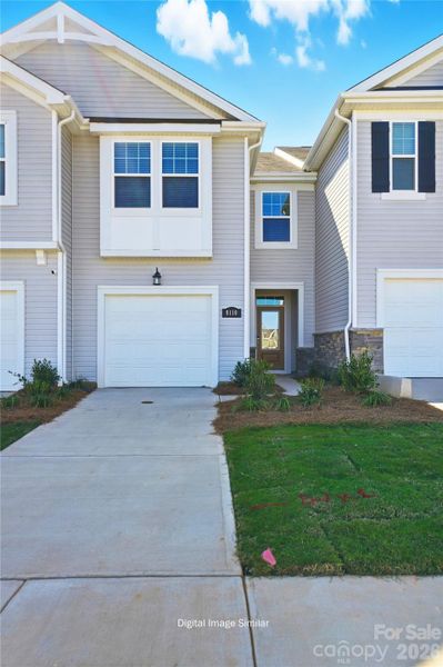 Front exterior of a new home in Cheyney, Charlotte, NC, highlighting curb appeal (Image 2). Front exterior of a new home in Cheyney, Charlotte, NC, highlighting curb appeal (Image 2).