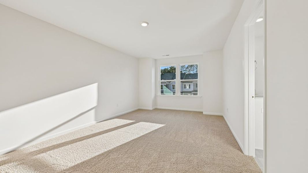 Spacious, unfurnished interior of a new home in Chapel Townes, Raleigh (Image 23).