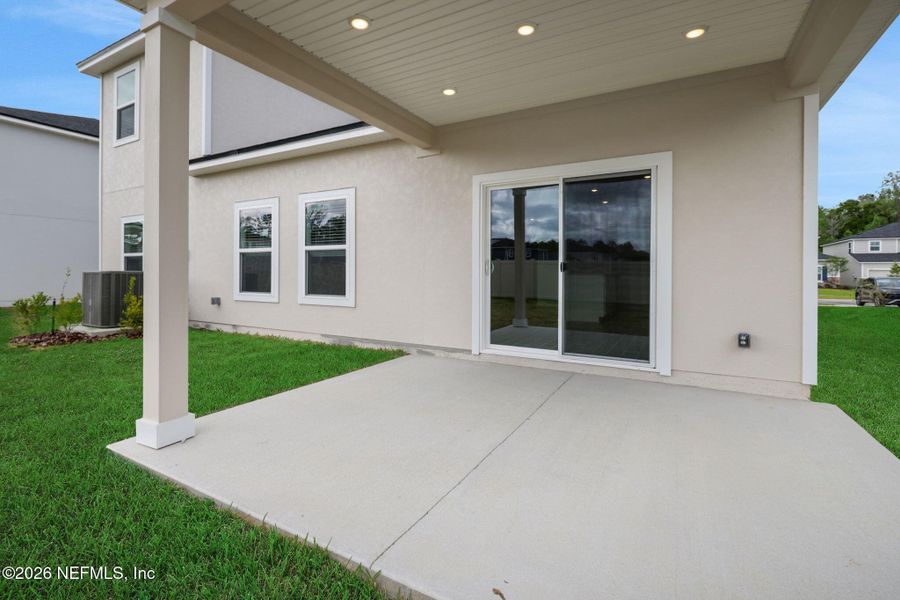 Exterior details and patio area of a home in Wilford Oaks, Orange Park (Image 3).