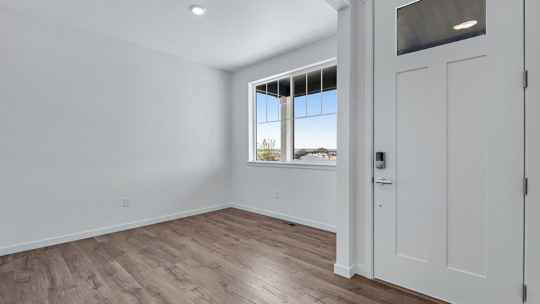 Spacious, unfurnished interior of a new home in Trails at Crowfoot, Parker (Image 18).