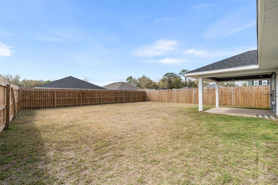 Exterior details and patio area of a home in Country Way South, Newberry (Image 25).