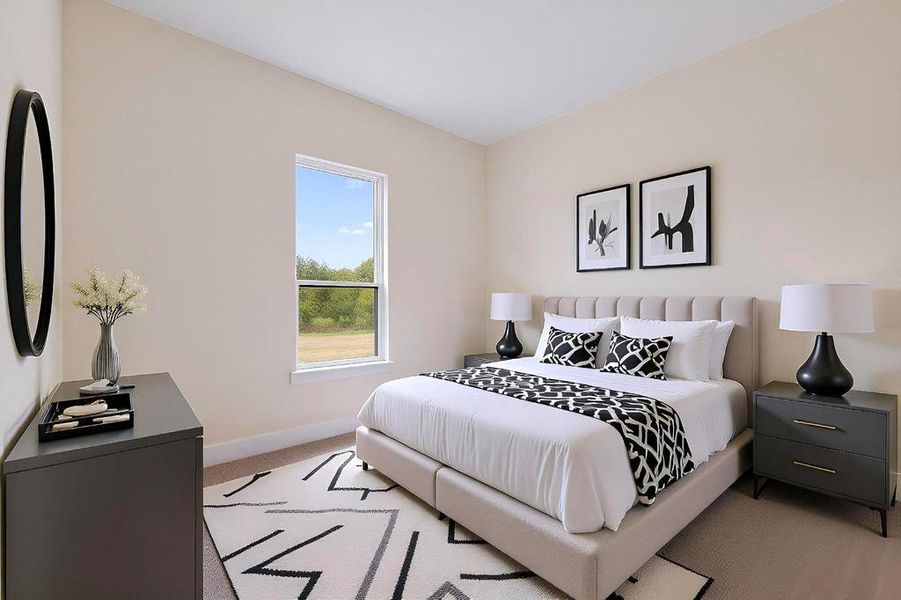 Bedroom with light carpet and baseboards Bedroom with light carpet and baseboards