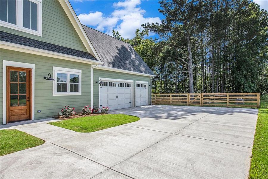 Front exterior of a new home in , Canton, GA, highlighting curb appeal (Image 1). Front exterior of a new home in , Canton, GA, highlighting curb appeal (Image 1).