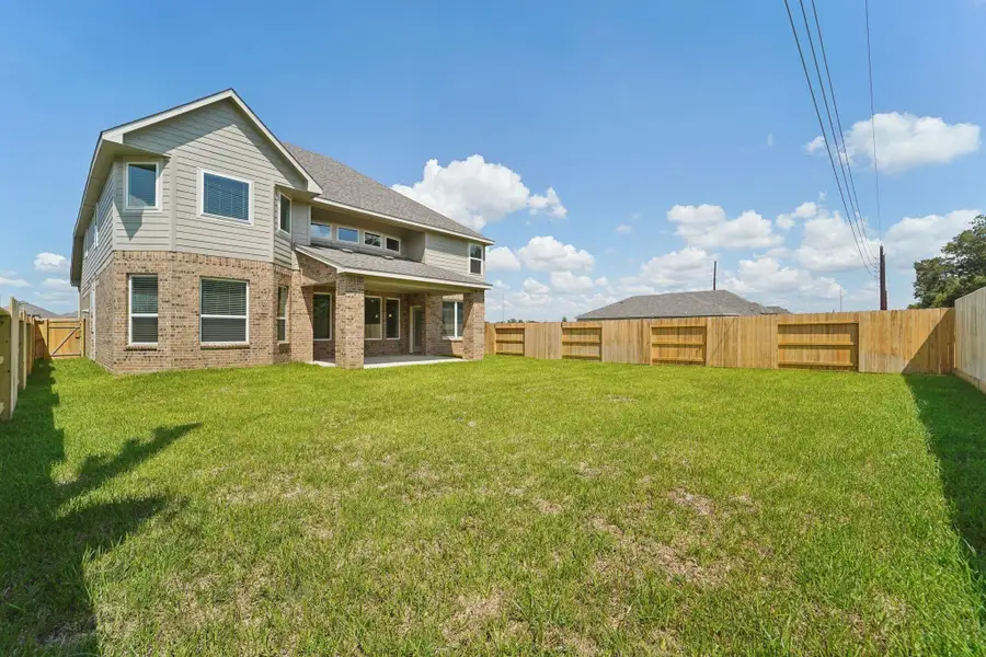 Exterior details and patio area of a home in Kingdom Heights, Rosenberg (Image 2). Exterior details and patio area of a home in Kingdom Heights, Rosenberg (Image 2).