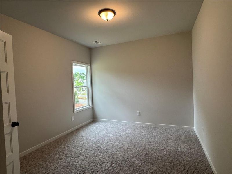 Spacious, unfurnished interior of a new home in Rosewood Lake Preserve, Hoschton (Image 31).