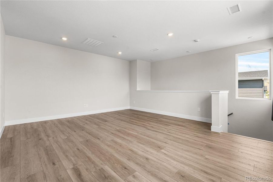 Spacious, unfurnished interior of a new home in Storytellers at Lyric, Lone Tree (Image 22).