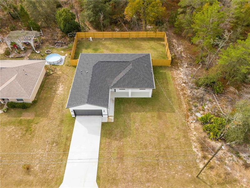 Front exterior of a new home in , Ocklawaha, FL, highlighting curb appeal (Image 16).