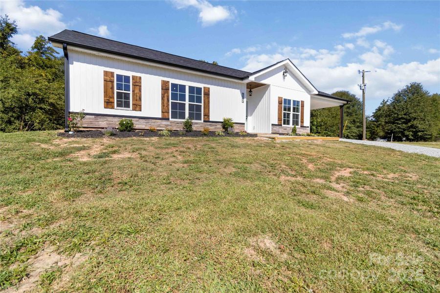 Front exterior of a new home in , Chester, SC, highlighting curb appeal (Image 18).