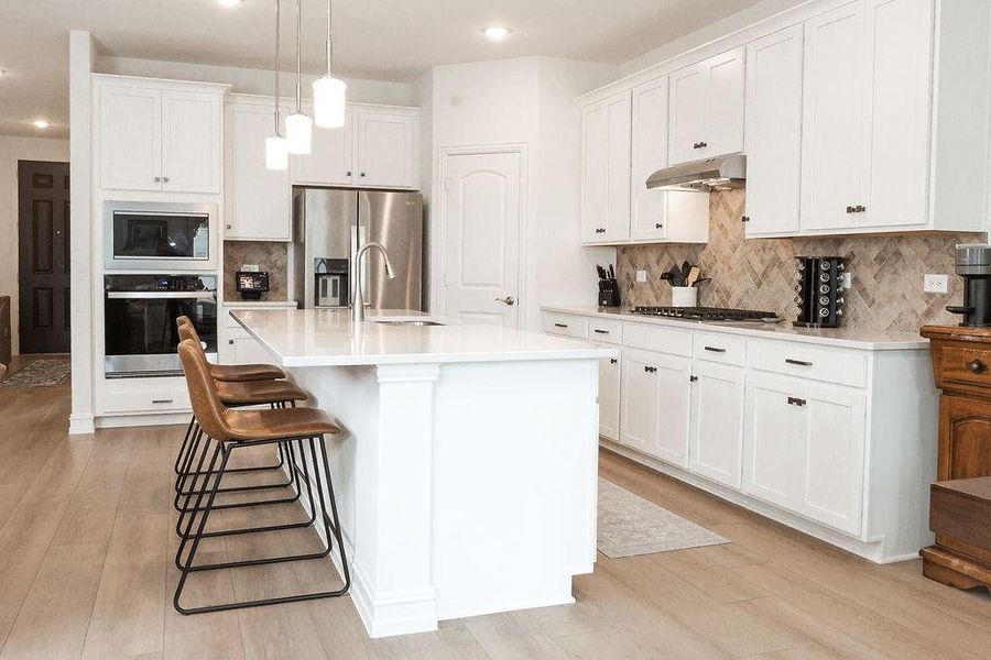 Furnished interior view inside a new home in Pecan Square, Northlake (Image 6).