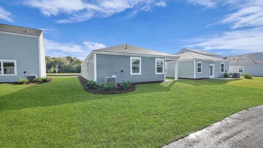 Exterior details and patio area of a home in The Oaks at Center Station, Hollywood (Image 3).