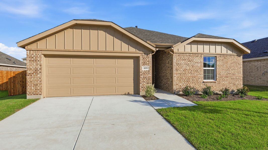 Front exterior of a new home in Patriot Estates, Venus, TX, highlighting curb appeal (Image 21). Front exterior of a new home in Patriot Estates, Venus, TX, highlighting curb appeal (Image 21).