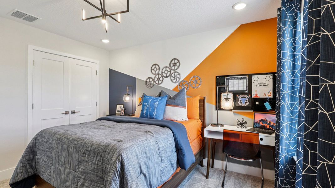 The Mangrove Second Floor Bedroom at Lakeside at Satilla by DRB Homes in Saint Cloud, FL