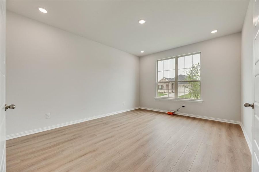 Spacious, unfurnished interior of a new home in Villages of Hurricane Creek, Anna (Image 22).