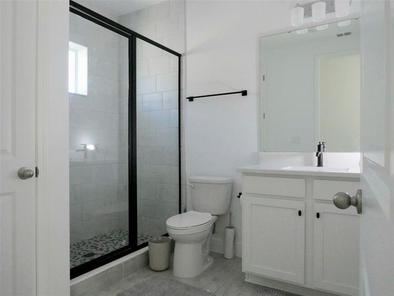 Furnished interior view inside a new home in Laureate Park, Orlando (Image 10).