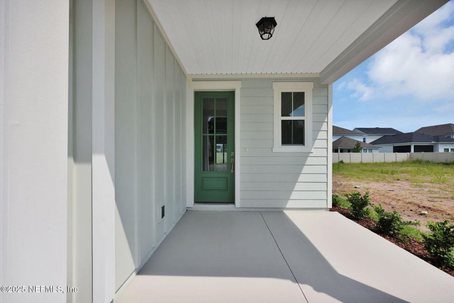 Front exterior of a new home in Seabrook Village at Nocatee, Ponte Vedra, FL, highlighting curb appeal (Image 25).