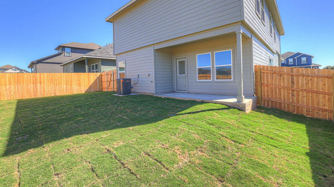 Exterior details and patio area of a home in Paramount, Kyle (Image 4).