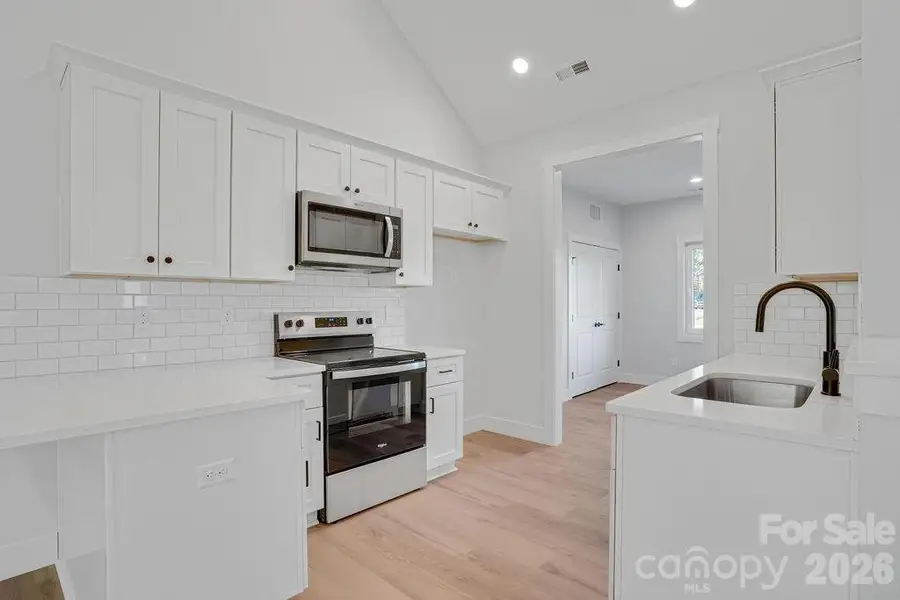 Furnished interior view inside a new home in , Connelly Springs (Image 4).