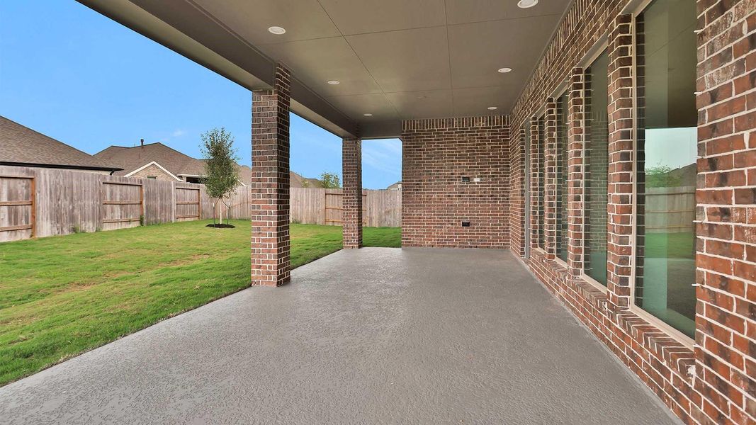 Exterior details and patio area of a home in Valencia, Manvel (Image 2). Exterior details and patio area of a home in Valencia, Manvel (Image 2).