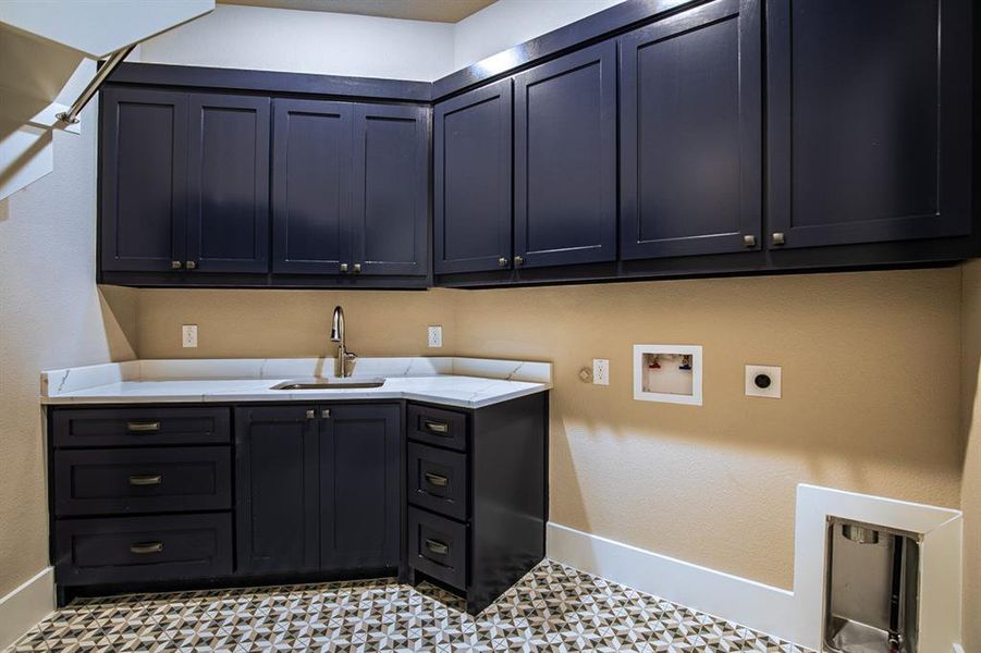 Laundry room with sink, gas & electric dryer hookup, cabinets, hookup for a washing machine, and light tile patterned floors