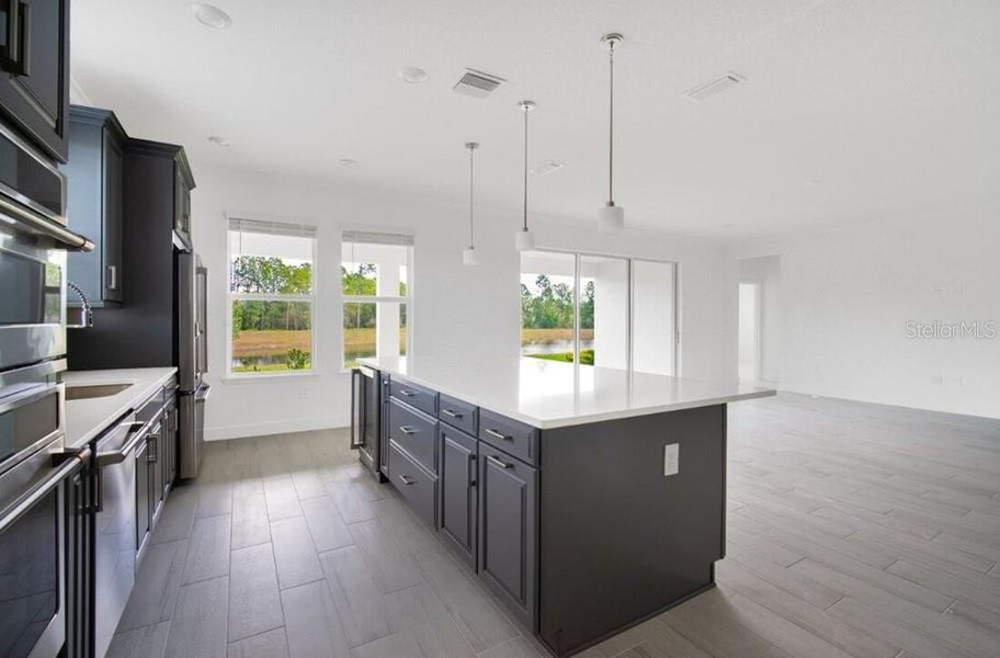 Furnished interior view inside a new home in Harvest at Ovation, Winter Garden (Image 11).